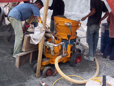 Shotcrete machine for steep slope stabilization