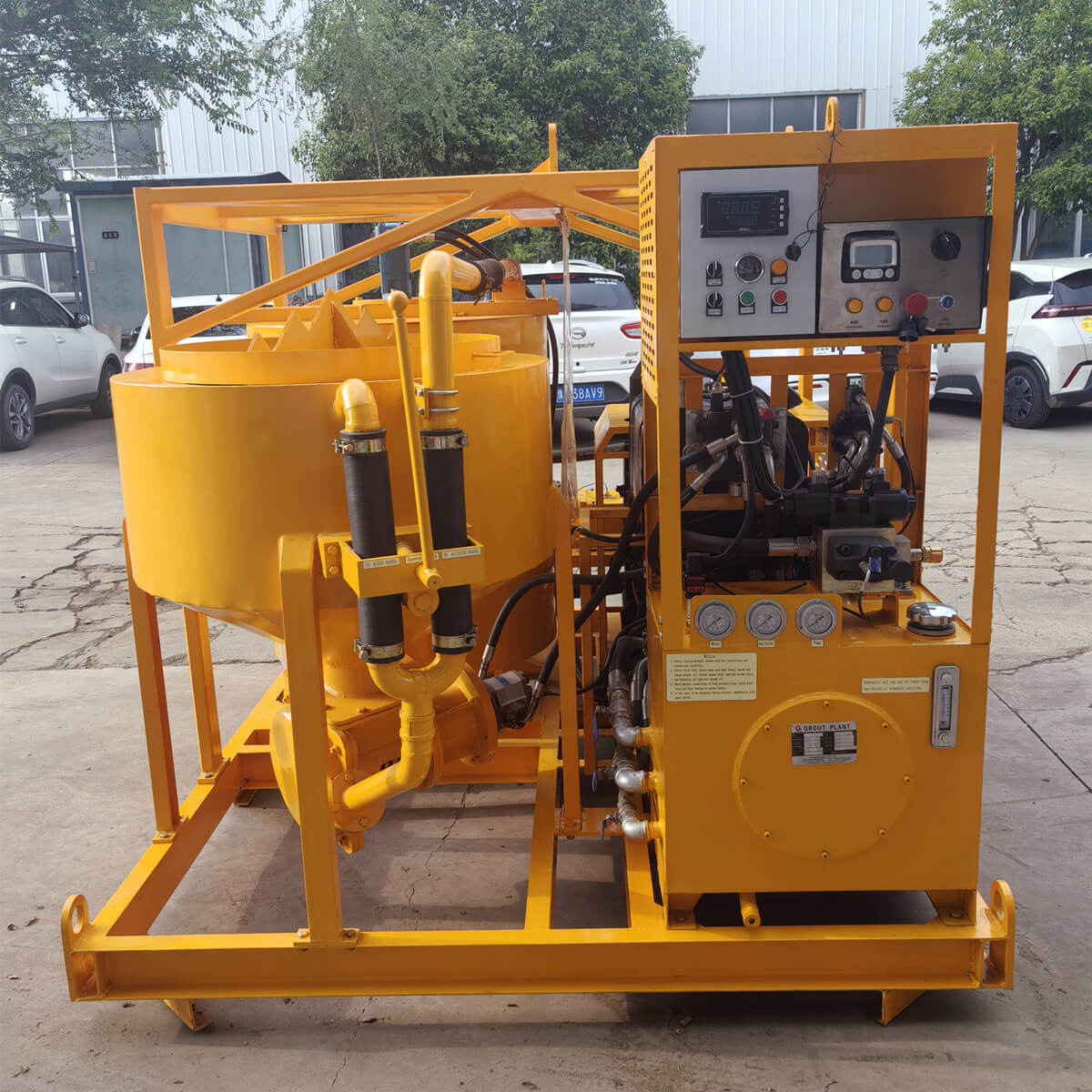 Foundation grouting mixing and pumping system