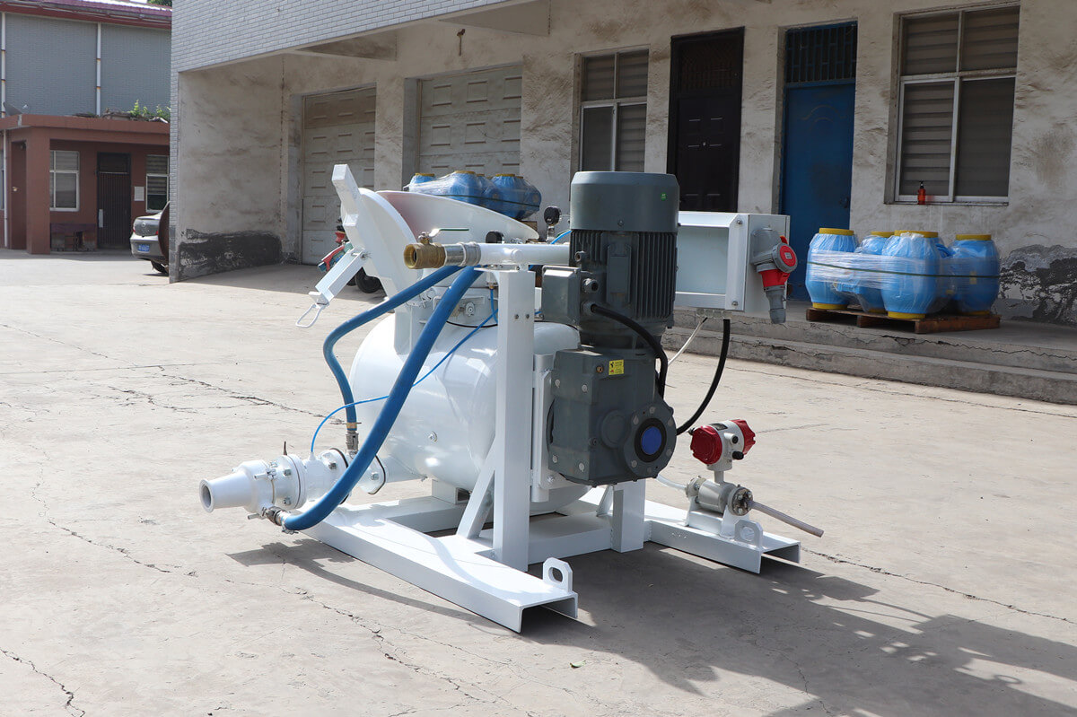 pneumatic concrete mixing and conveying unit