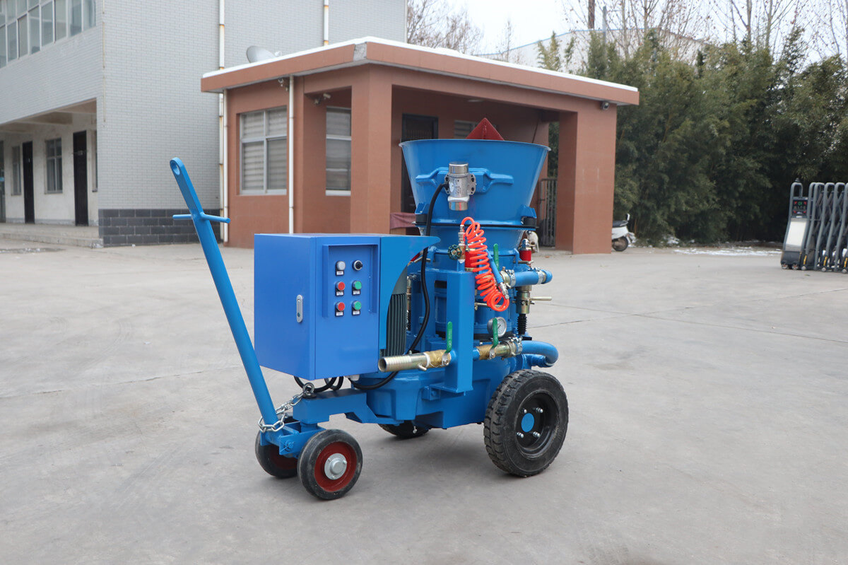 gunite machine for spraying refractory