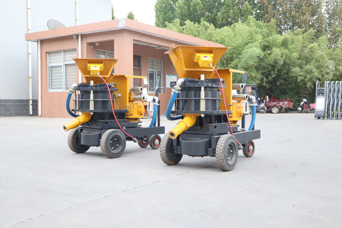 Shotcrete machine for wet and dry application